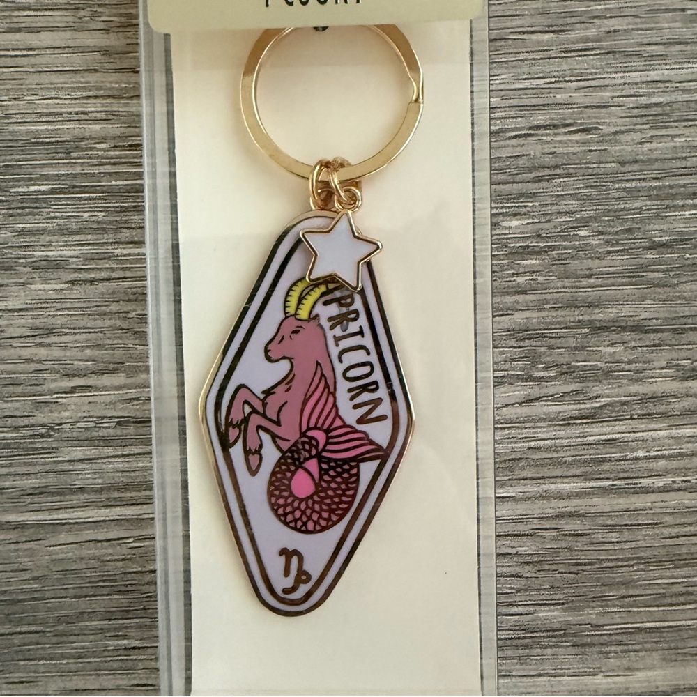 Zodiac Capricorn Keychain by Expressions in Purple and Gold